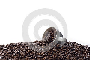 Coffee Cup and Spilled Coffee Beans