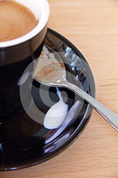 Coffee cup, spoon, saucer