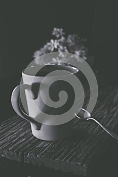 Coffee cup with steam set in low light background,Coffee in love concept.