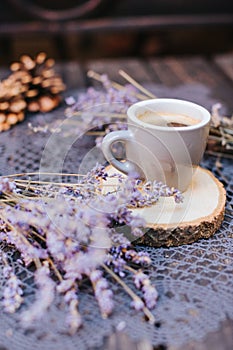 Coffee cup on table. Cup of hot latte coffee in the relaxing time. cup of coffee on wooden. Lavender. Aroma of lavender. Aroma of