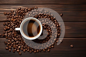 Coffee cup top view on wooden table background