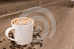 Coffee cup topping with art design for background.