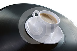 Coffee-cup on vinyl record