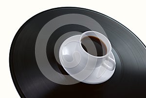 Coffee-cup on vinyl record