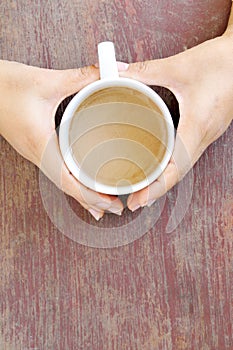 Coffee cup in woman hand