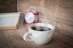 Coffee cup on wood background