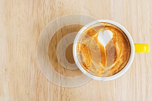 Coffee cup on wood table.