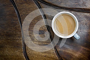 Coffee cup on wood table.