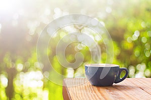 Coffee cup with on wood table