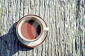 Coffee cup on wood teble