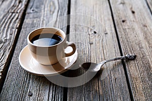 Coffee cup on wooden table background,Top view