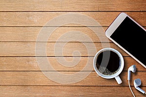 Coffee cup on wooden table top view