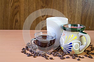Coffee cups with coffee beans on the table. with Copy space photo