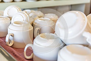 Coffee cups on shelf  in the elite popular bar