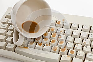 Coffee and damaged computer keyboard