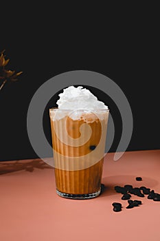 coffee drink and beverage with whipping cream on color and black background