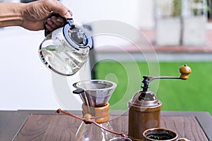 Coffee drip equipment set on wooden table