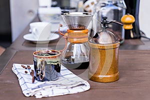 Coffee drip equipment set on wooden table