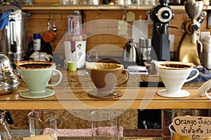 Coffee in dripping filter on stand