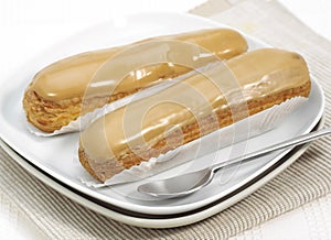 COFFEE ECLAIR ON PLATE