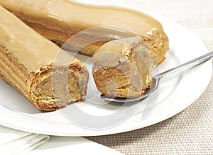 COFFEE ECLAIR ON A PLATE