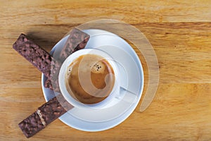 Coffee espresso cup with chocolate cookies.