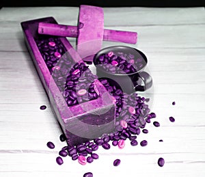 Coffee in espressocup and a grinder   on a wooden board