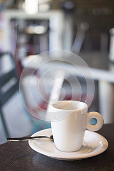 Coffee expresso cup spoon and saucer in restaurant cafe bar