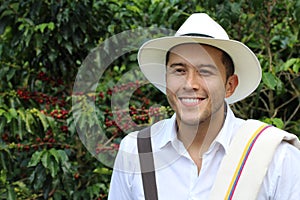 Coffee farmer in front of a plantation