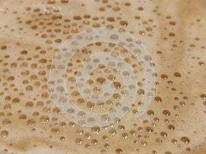 Coffee foam. Coffee foam. Fabstract spotted background