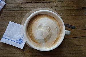 A Coffee with foamed milk photo