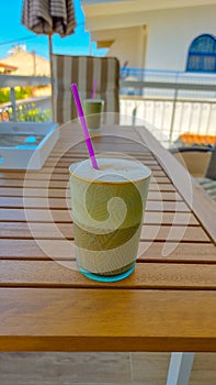 coffee frape cold on wooden table