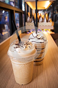 Coffee frappe in plastic cup. Favorite for coffee lover. In cafe view.