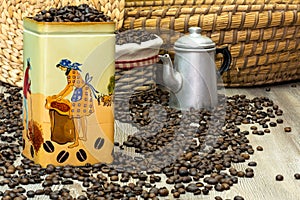 Coffee, fresh aromatic coffee beans in a metal box with coffee pot