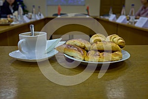 Coffee and fresh buns during the business meeting