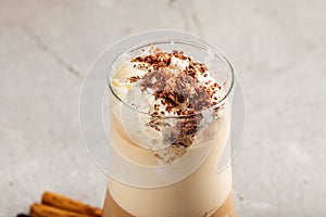 Coffee glace in a glass on the concrete background