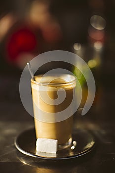Coffee in a glass on a terrace in Tetouan.