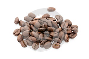 Coffee grains and leaves isolated on the white backgrounds.