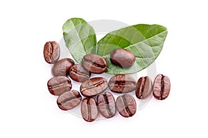 Coffee grains and leaves on white background