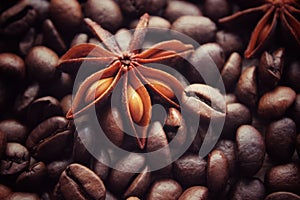 coffee grains and star anise on a wooden table, brown abstract background, warm texture, macro