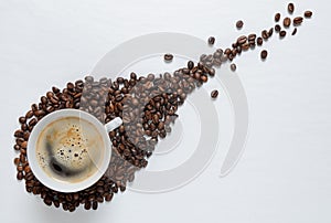 Coffee grains on white table