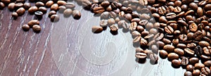 Coffee grains on a wooden table photo