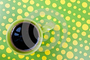 Coffee in green and yellow setting