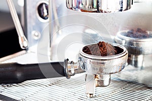 Coffee grind in group with coffee machine