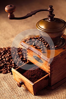 Coffee grinder with coffee bean and coffee powder