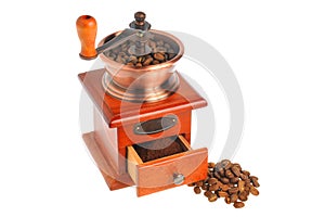Coffee grinder with coffee beans isolated on white background