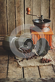 Coffee grinder, coffeepot and roasted coffee beans photo