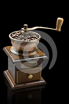 Coffee grinder over black