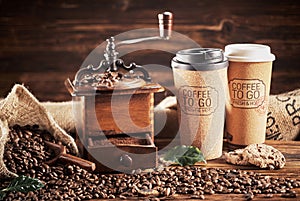 Coffee with grinder and Coffee To Go cups photo