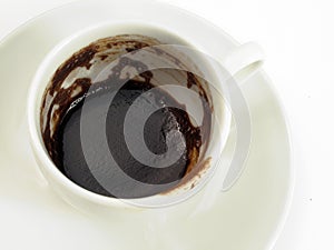 Coffee grounds in cup photo